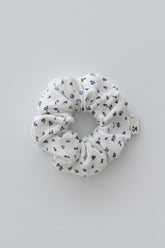 Indigo whisper floral scrunchie with navy flower print on white – Avauma